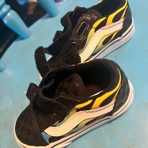 Colorful flame check vans